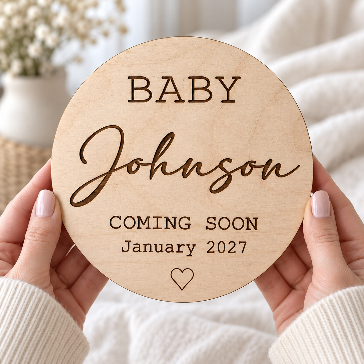 Personalised pregnancy photo prop held in hands, with Baby Johnson Coming Soon and January 2027 engraving