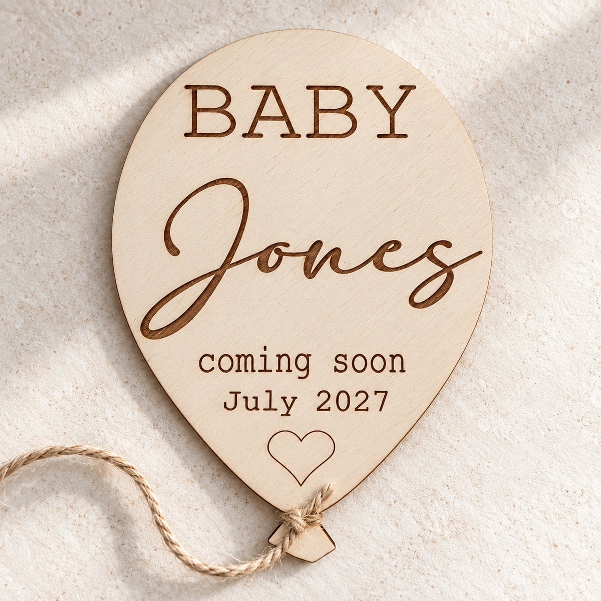 Complete wooden Baby Coming Soon balloon plaque with heart engraving and natural jute twine