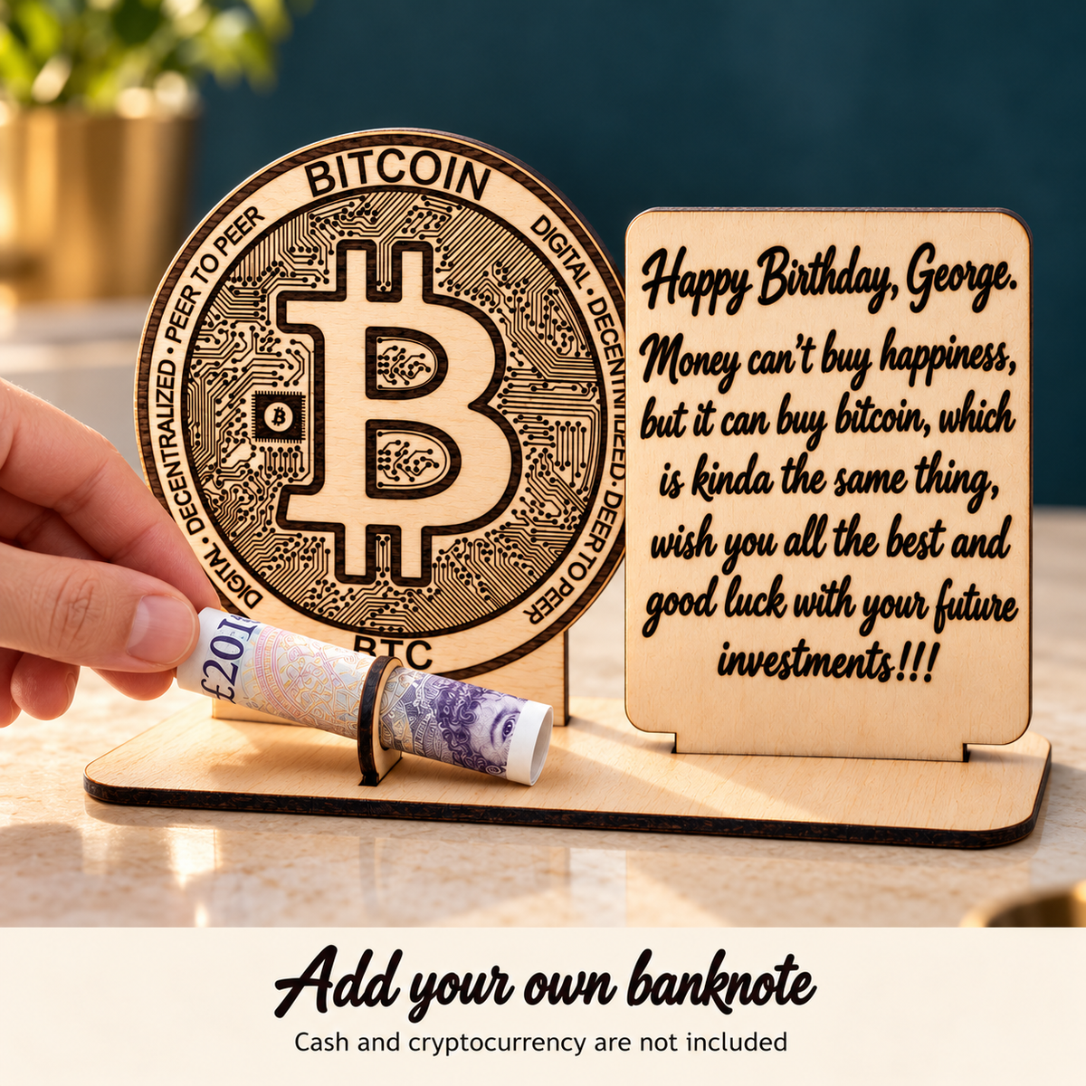Hand inserting a rolled banknote into the wooden Bitcoin gift holder; cash and cryptocurrency not included