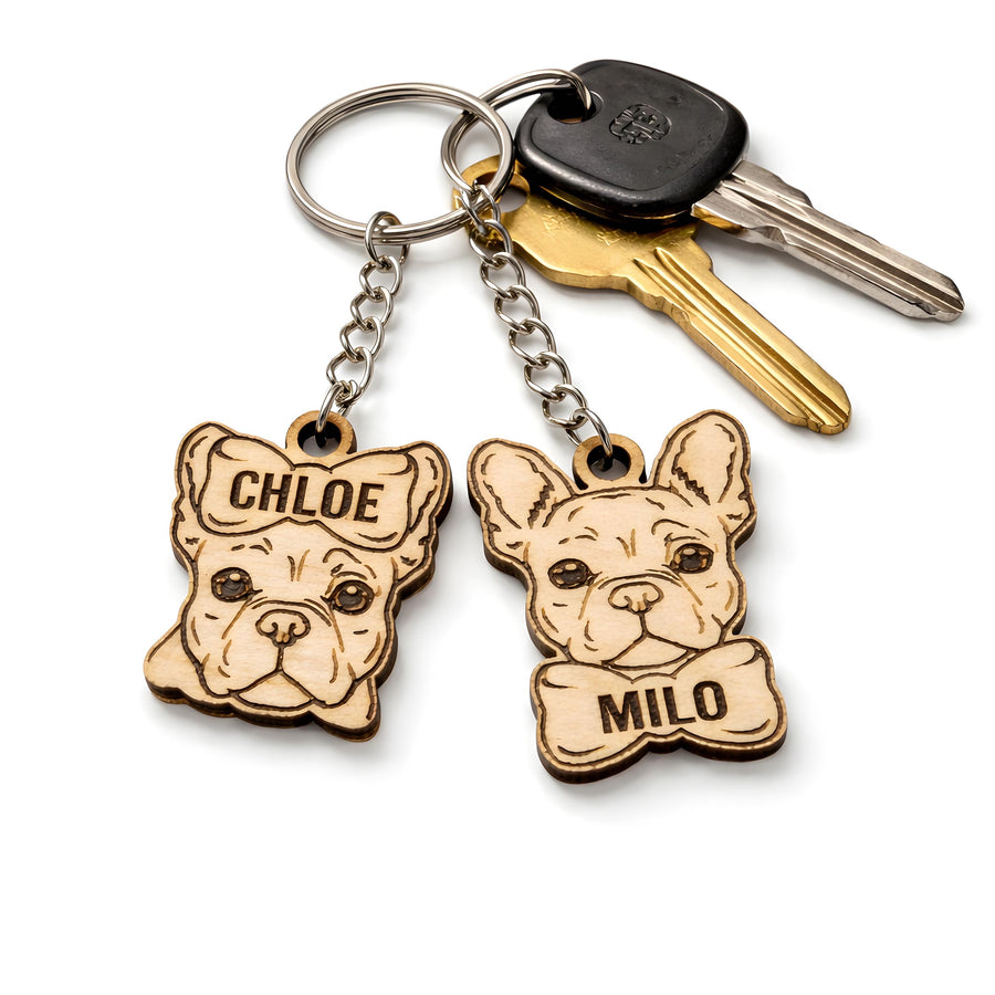 Personalised French Bulldog Keyring attached to the keys on white background.