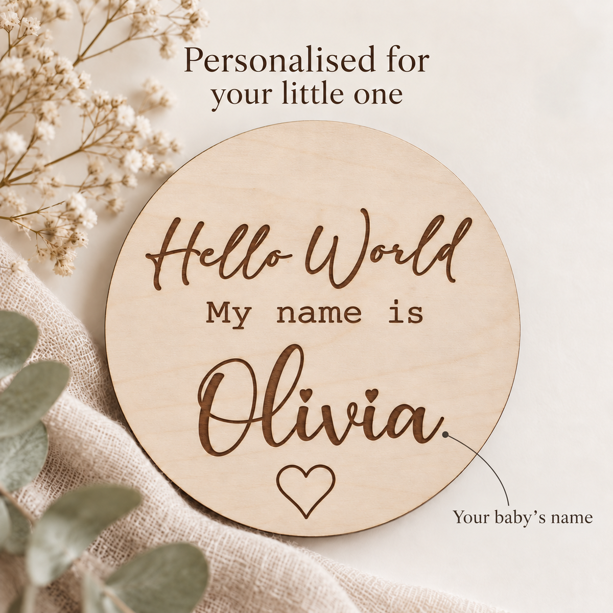 Personalisation example showing the baby's name Olivia on the Hello World wooden card