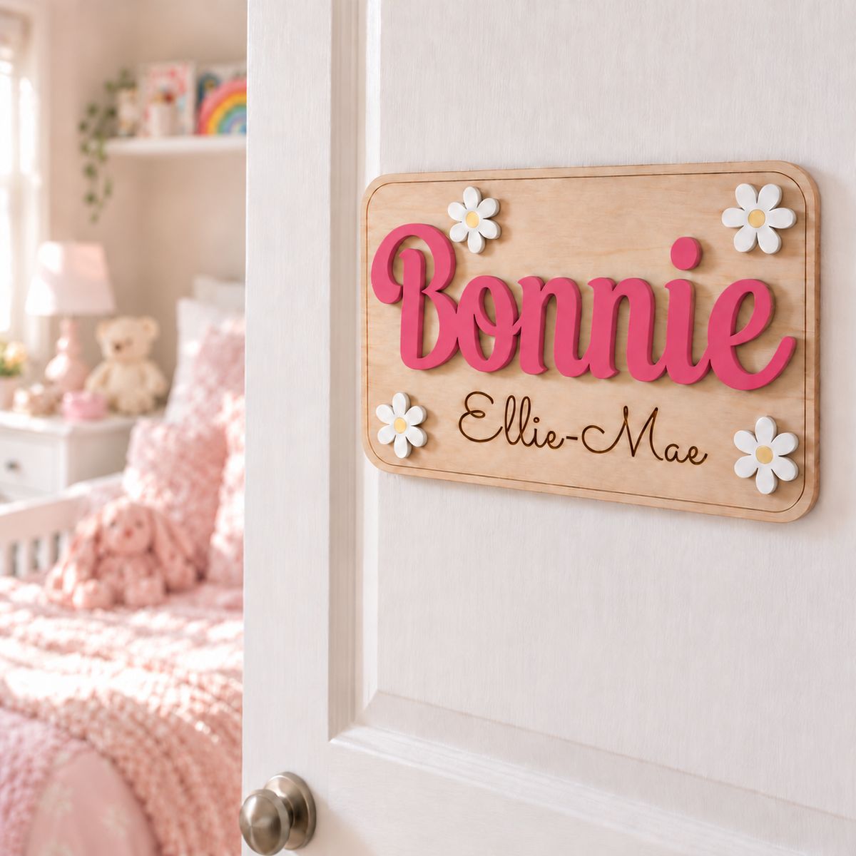 Deep pink Bonnie raised name on a rectangular wooden daisy door plaque