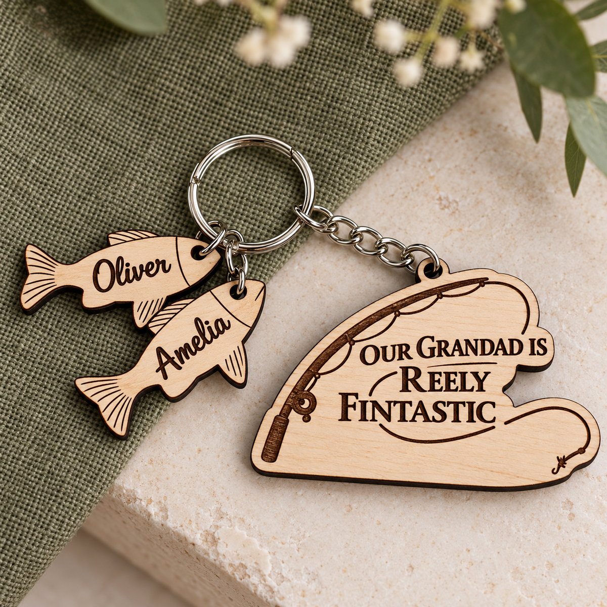 Our Grandad is Reely Fintastic personalised fishing keyring with fish charms engraved Oliver and Amelia