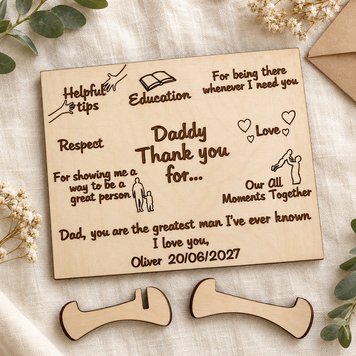 Wooden Father's Day card and two interlocking stand pieces arranged on ivory linen
