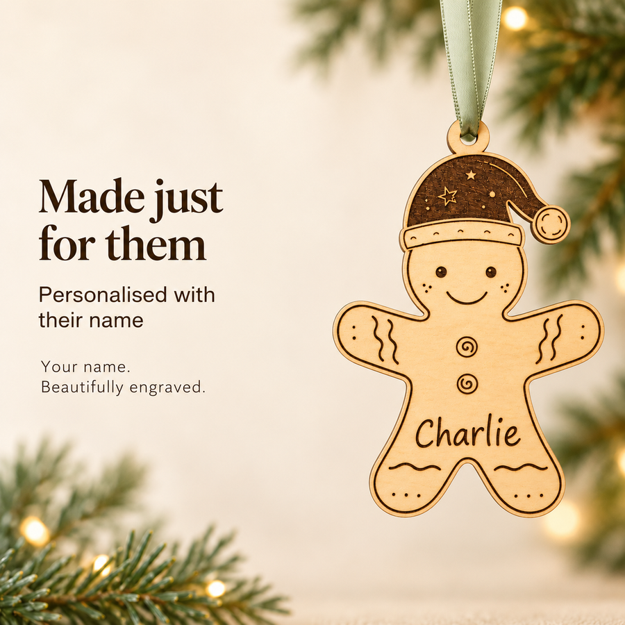 Personalised gingerbread man ornament with Charlie engraved on the belly beside the words Made just for them