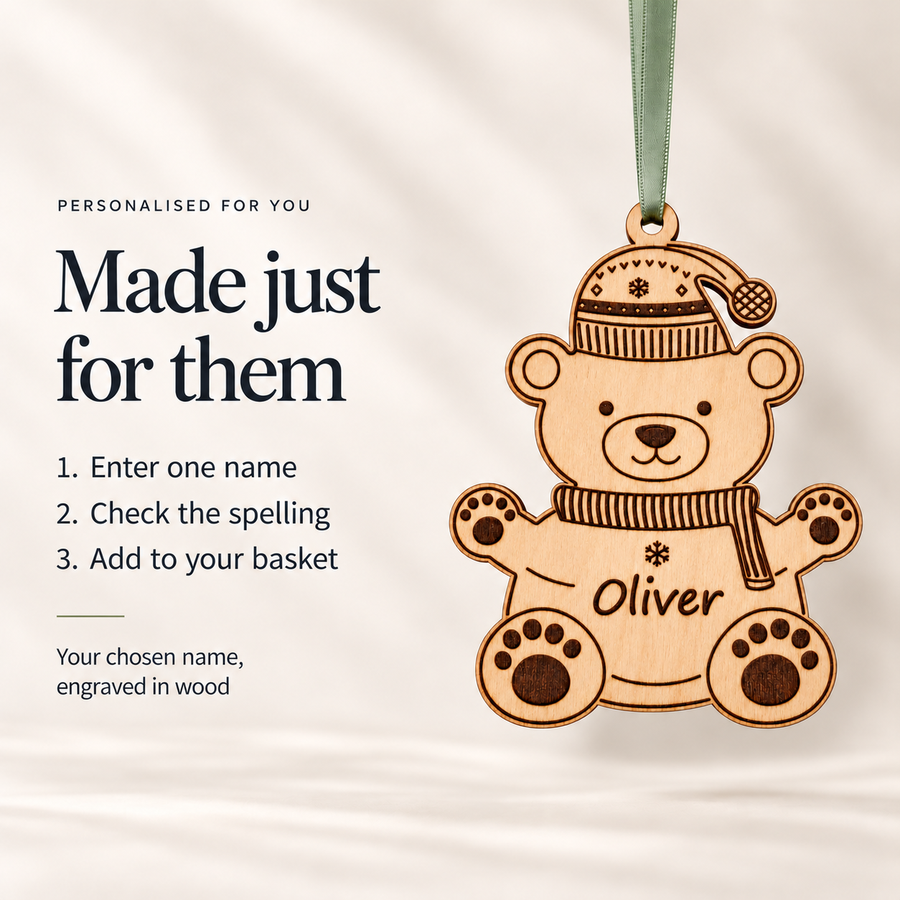 Personalisation guide beside a wooden polar bear bauble: enter one name, check the spelling and add to your basket.