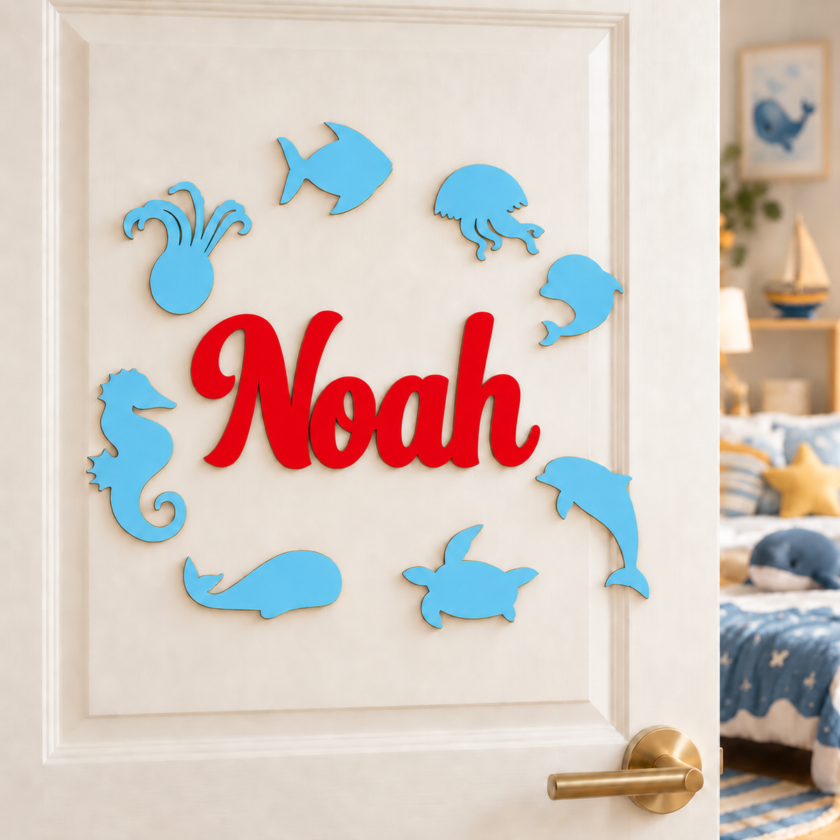 Red Noah personalised wooden name sign and Pastel Blue sea animals displayed on a bedroom door