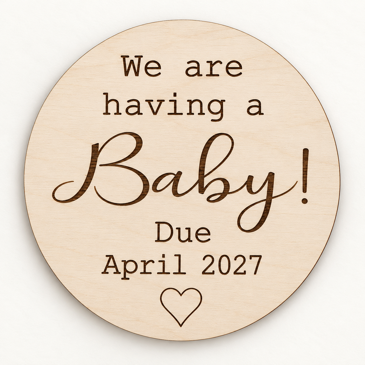 Round birch We are having a Baby plaque engraved Due April 2027 with an outline heart on an ivory background