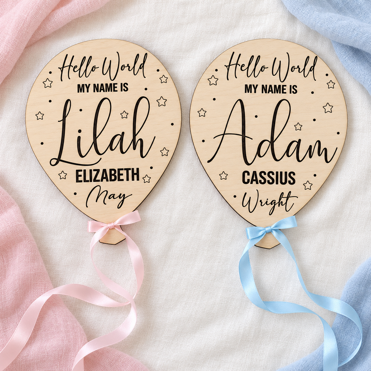Pink and blue ribbon options on engraved Hello World balloon signs with stars