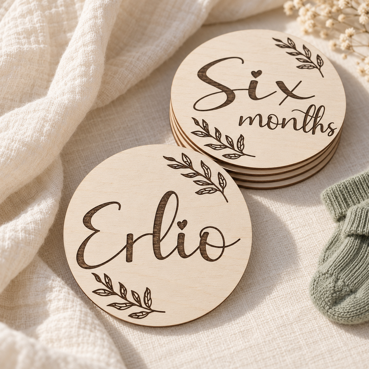Personalised Erlio name card beside stacked monthly wooden photo cards