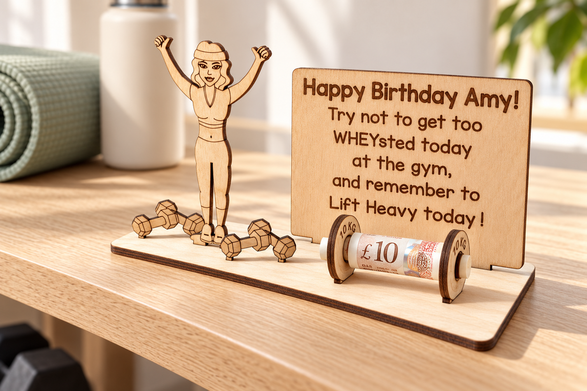 Gym birthday cash gift for her with a female gym figure, wooden dumbbells and personalised message plaque