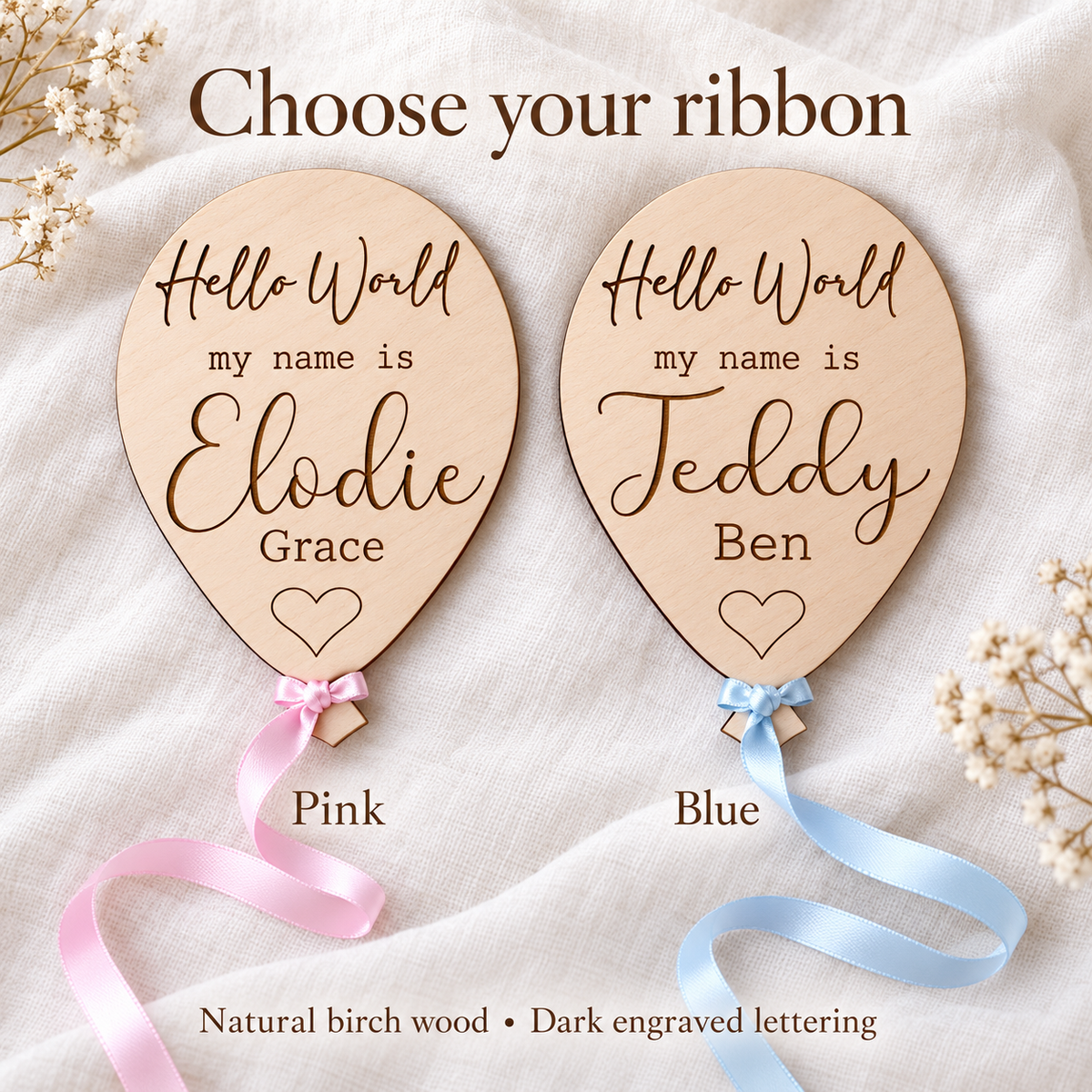 Pink and blue satin ribbon options on personalised engraved Hello World wooden balloon plaques.