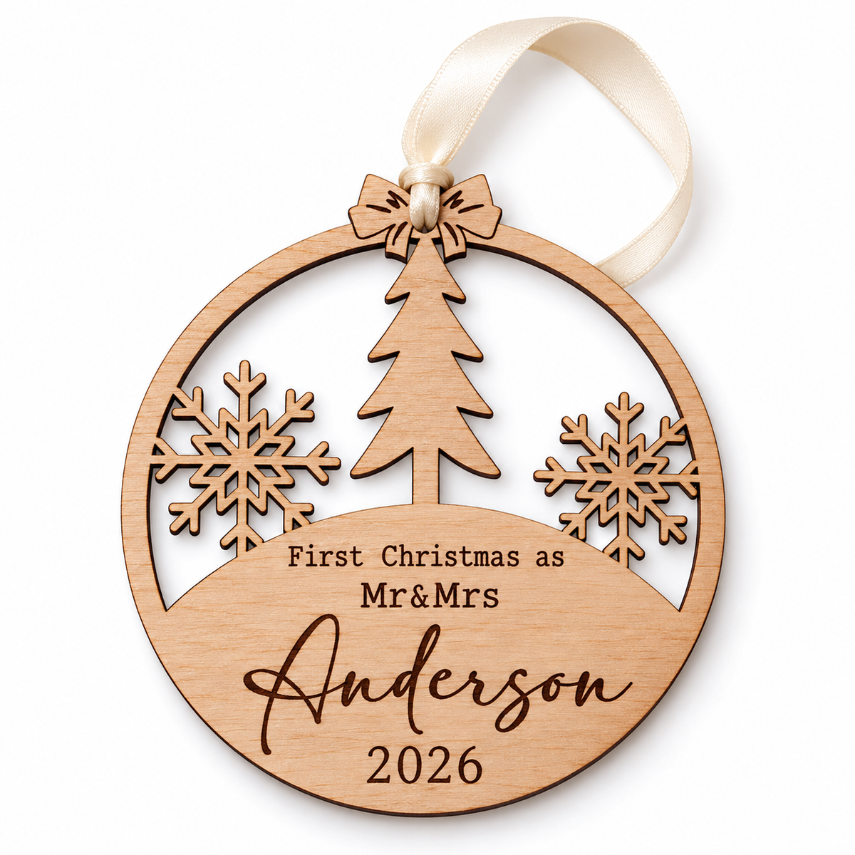 Mr and Mrs first Christmas wooden bauble with engraved surname and year on a white background