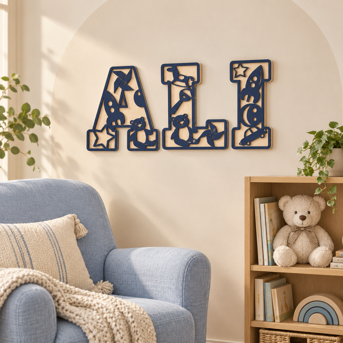 Navy Blue ALI personalised wooden toy name letters with natural birch back layers above a nursery reading corner