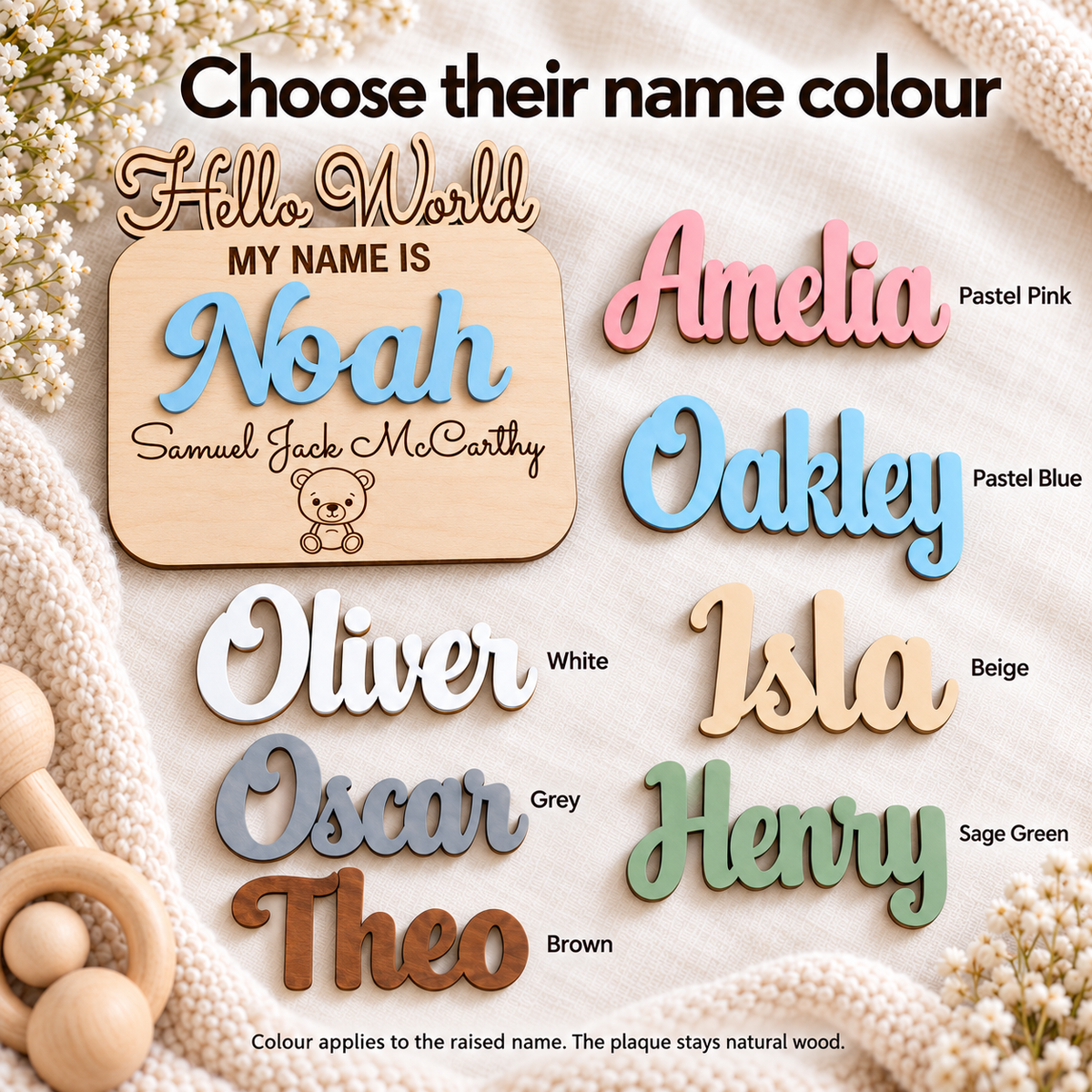 Raised name colour guide showing Pastel Pink, Pastel Blue, White, Beige, Grey, Brown and Sage Green on a natural wood background.