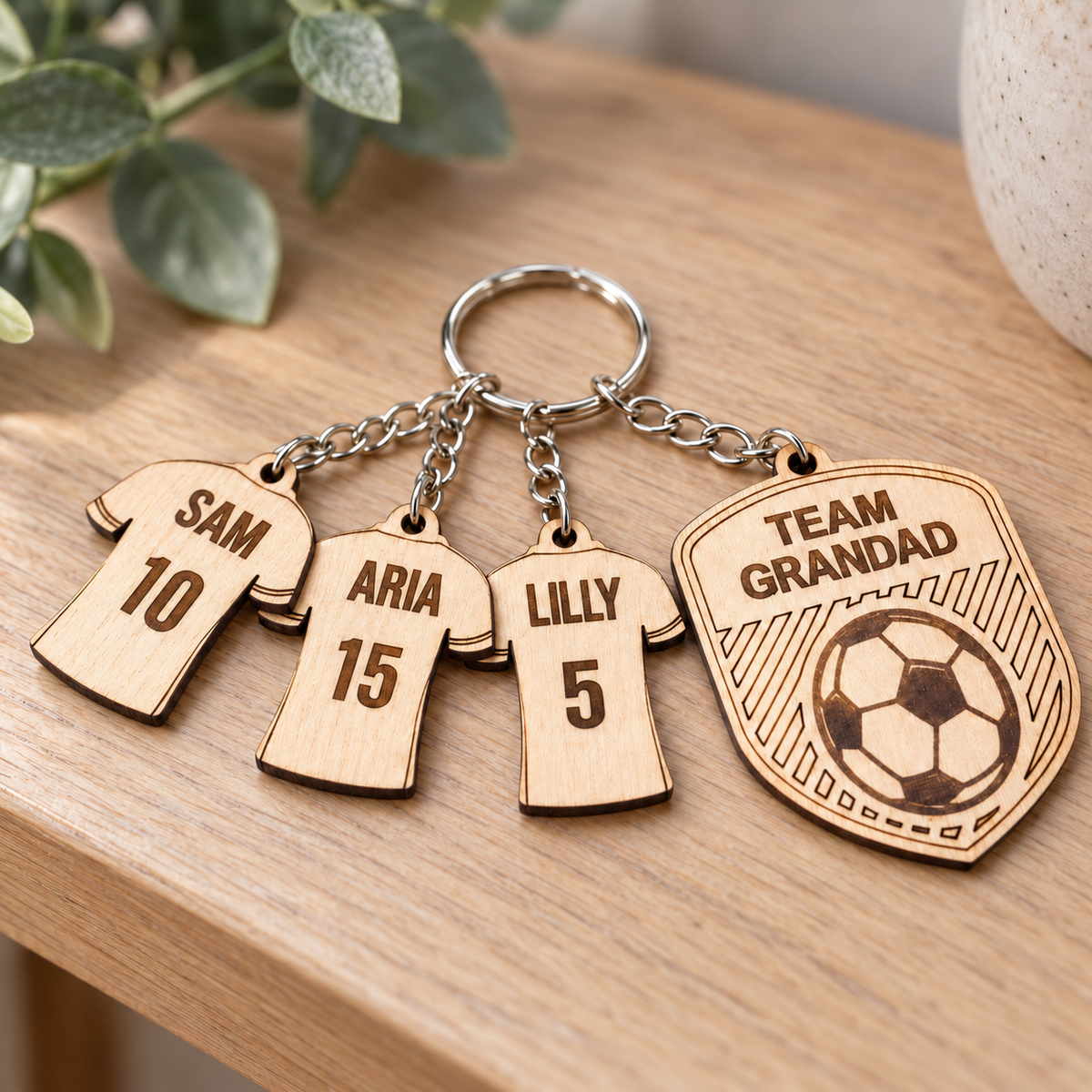 Team Grandad football keyring with Sam 10, Aria 15 and Lilly 5 personalised shirt charms