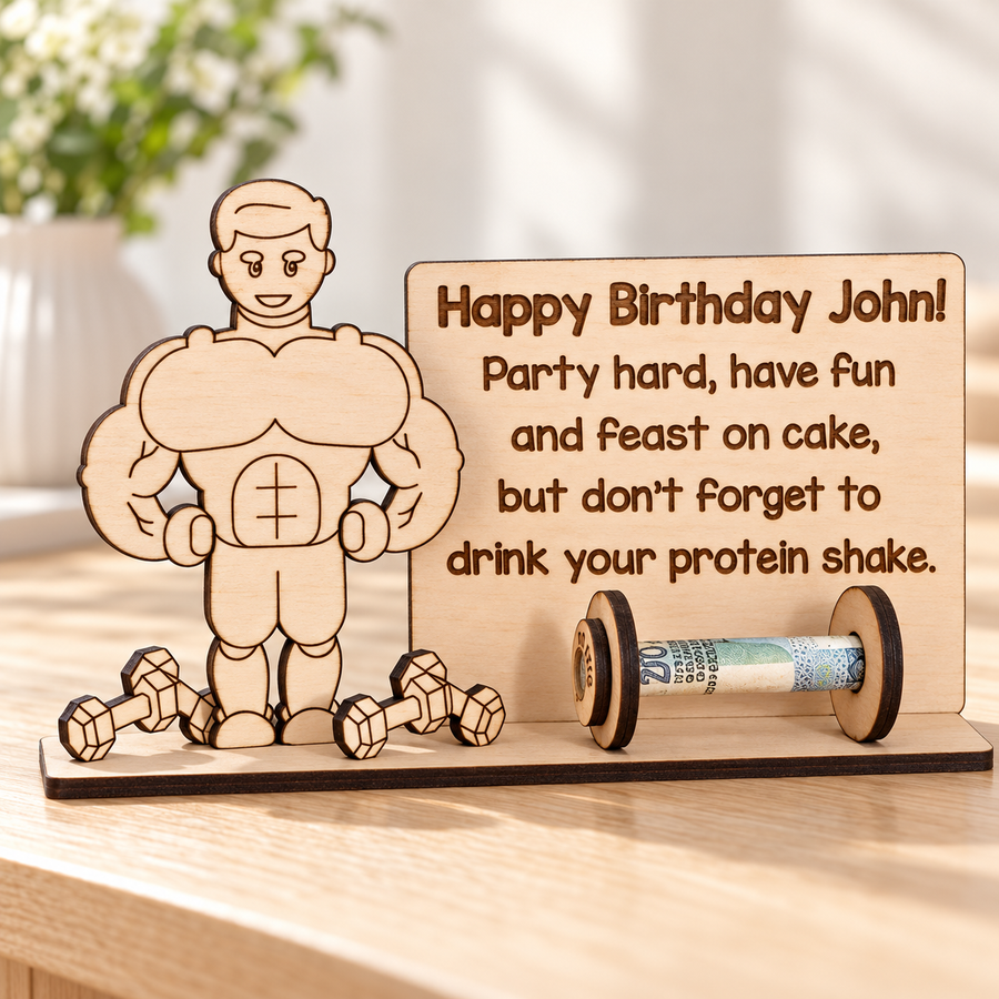 Personalised wooden gym money holder for John with a bodybuilder, birthday message and rolled banknote barbell on a wooden base