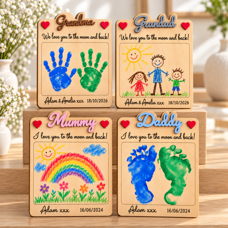 Four example personalised wooden plaques displayed symmetrically: Grandma with handprints, Grandad with a crayon family drawing, Mummy with a crayon rainbow and Daddy with footprints. Each plaque sold separately.