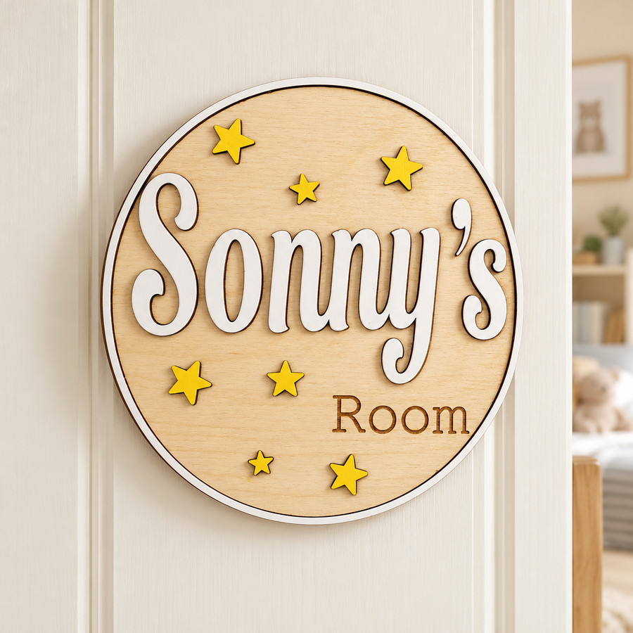 Personalised wooden bedroom door sign reading Sonny’s Room, with a white raised name and yellow stars on an ivory door