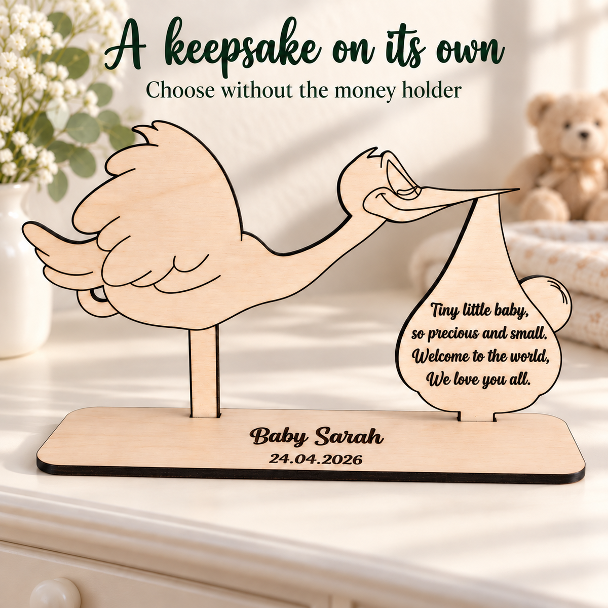 Personalised stork keepsake without money holder, displayed on a solid wooden base
