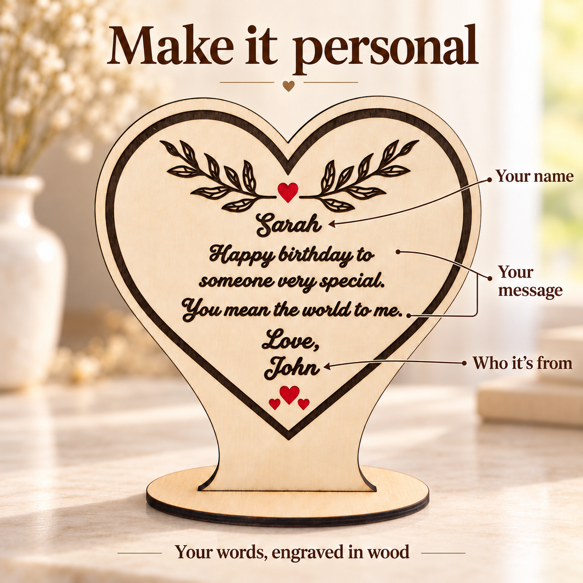 Personalisation example showing the name, engraved message and sender on a wooden heart