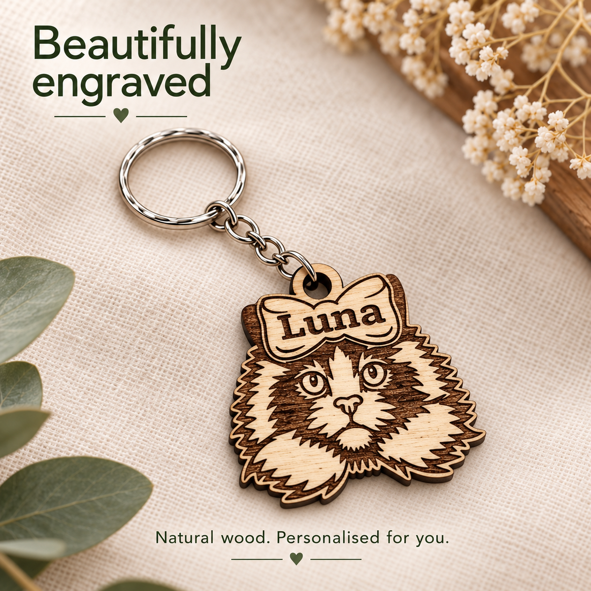 Close-up of the Ragdoll cat design and Luna name laser engraved into natural wood