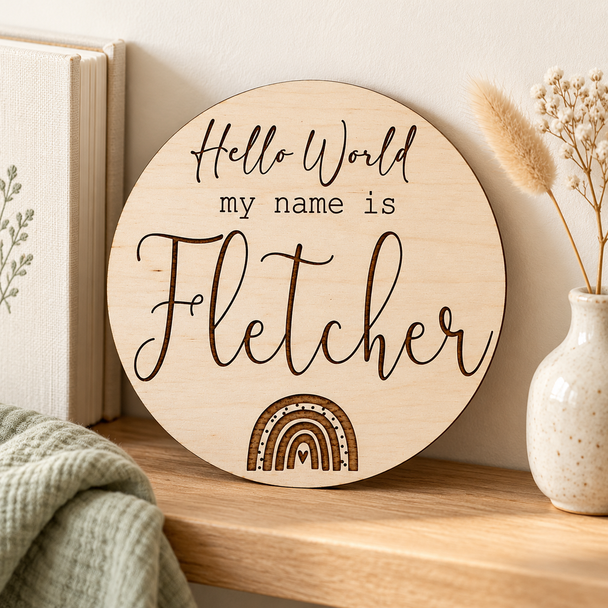 Fletcher rainbow baby name plaque displayed on a nursery shelf