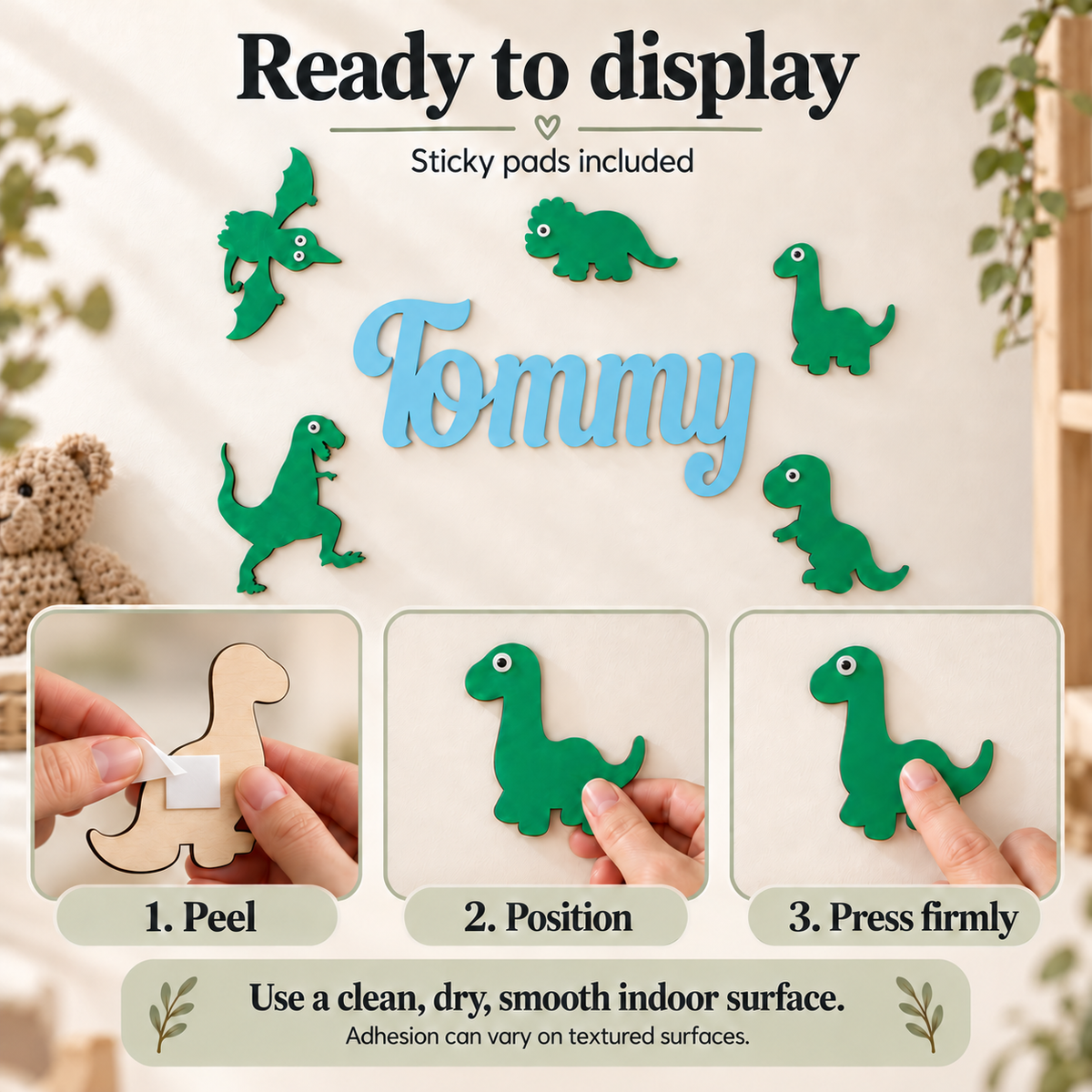 Sticky pads mounting guide for the personalised wooden name and five separate dinosaur decorations