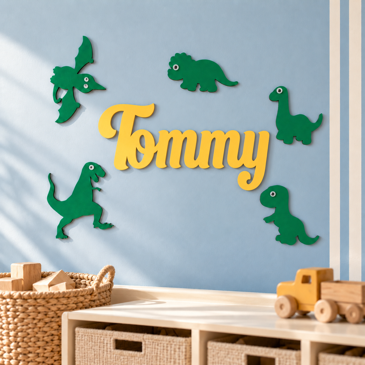 Yellow Tommy wooden name surrounded by five green dinosaur wall decorations in a child's room